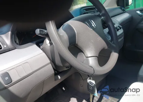 2010 Honda Odyssey Lx z USA, uszkodzony, nr VIN 5FNRL3H26AB025087